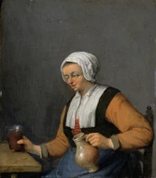 Eine Frau mit einem Bierkrug